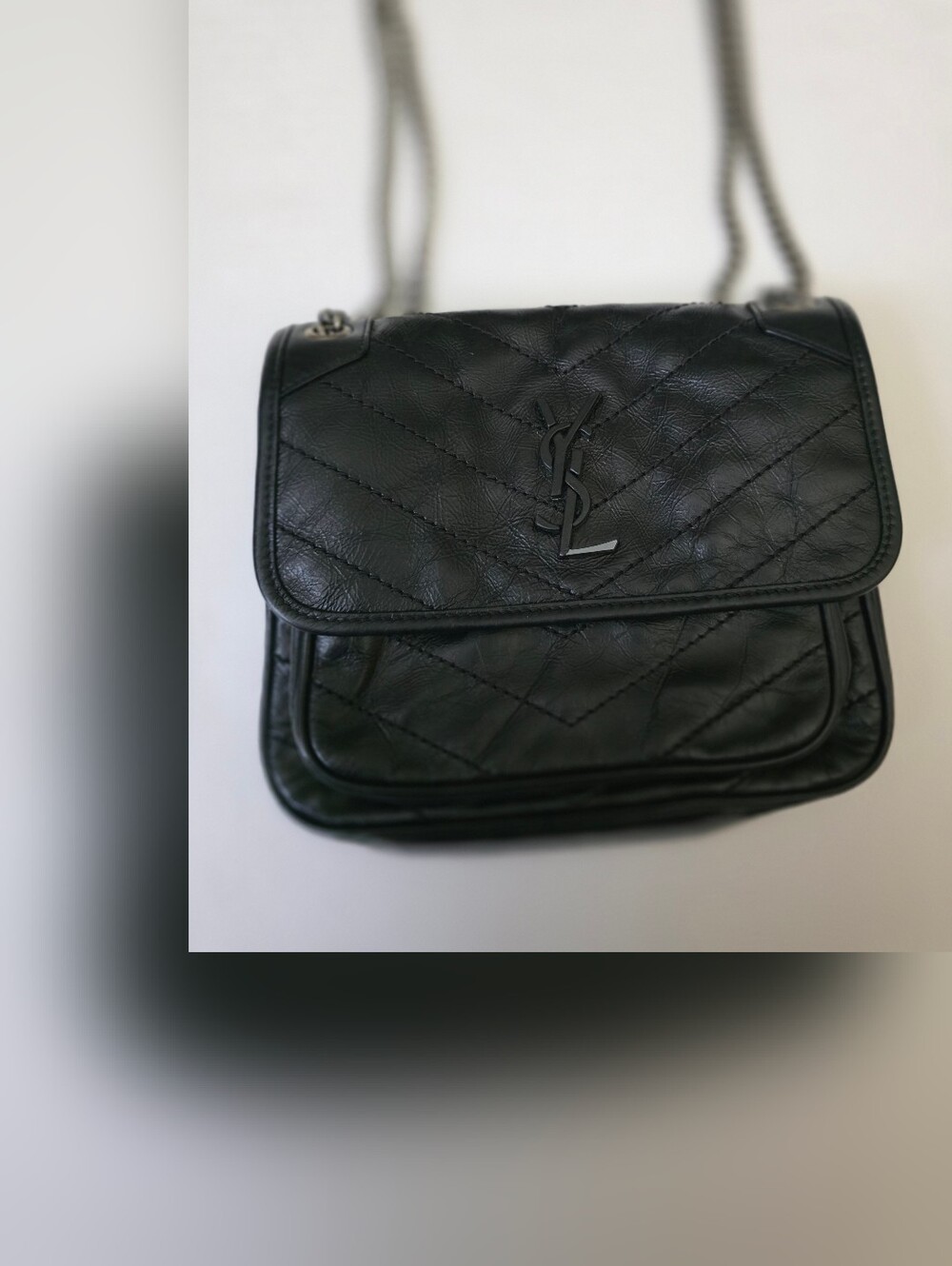 Saint Laurent Black Quilted Leather Snap Detail Used.